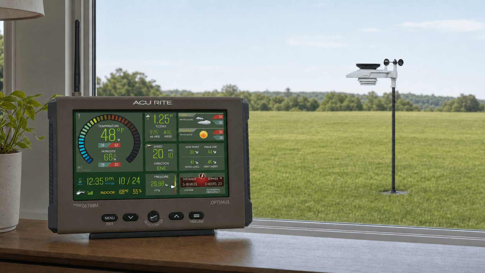 AcuRite Optimus 06050M sensor outdoors with 06188M HD display and its antenna upright indoors