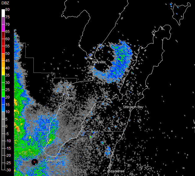 NWS Green Bay reflectivity frame showing a bird roost ring northeast of the radar and a separate band of rain approaching from the west